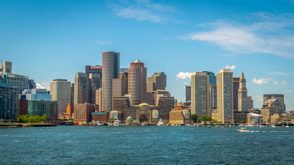 CFO Services in Massachusetts Boston Massachusetts city skyline along the water at dusk