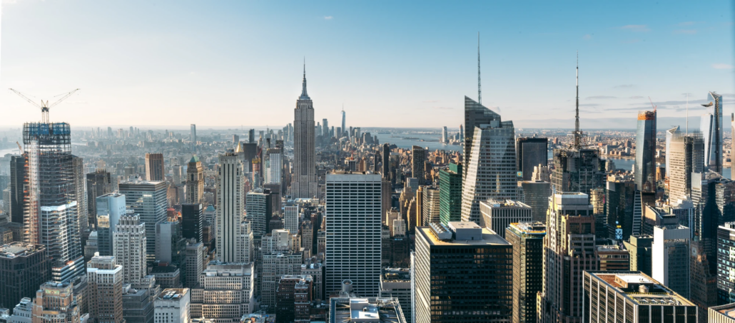 : CFO Services in New York Manhattan skyline along the water at dusk