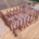 Aerial view of structural steel framework at an industrial building construction site.